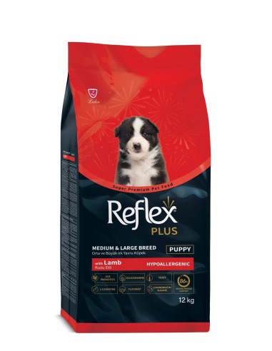 Reflex Plus Junior Dog Miel si Orez...